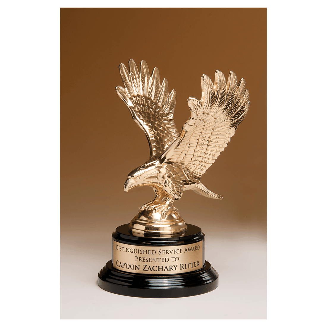 9" Fully Modeled Gold Finish Metal Eagle on a Black Piano Finish Base with a Gold Flex-Brass Plate