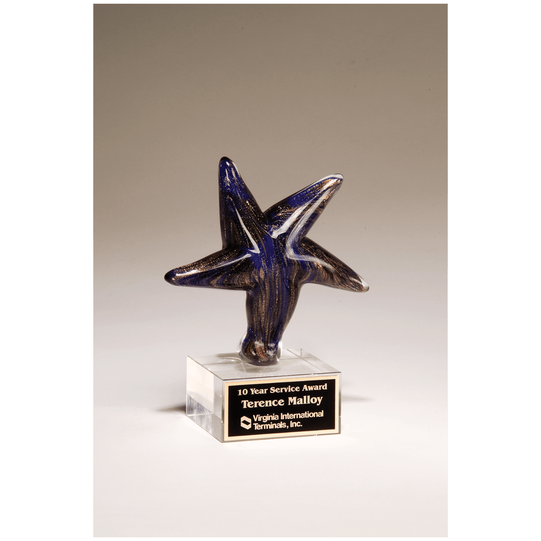 6 7/8" Blue Star Art Glass with Gold Metallic Highlights on Clear Glass Base and Black Laserable Aluminum Plate