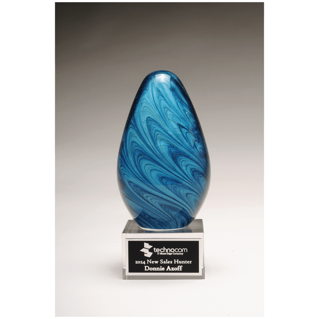 6 1/4" Blue and Green Egg Shaped Art Glass on Clear Glass Base with Black Laserable Aluminum Plate