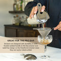 Bartender using a Hawthorne strainer with a double-welded handle