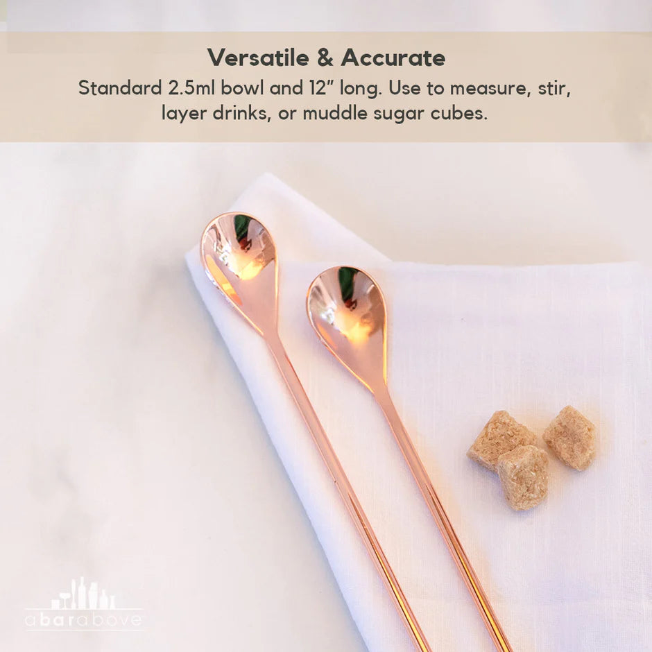 Set of two copper spoons