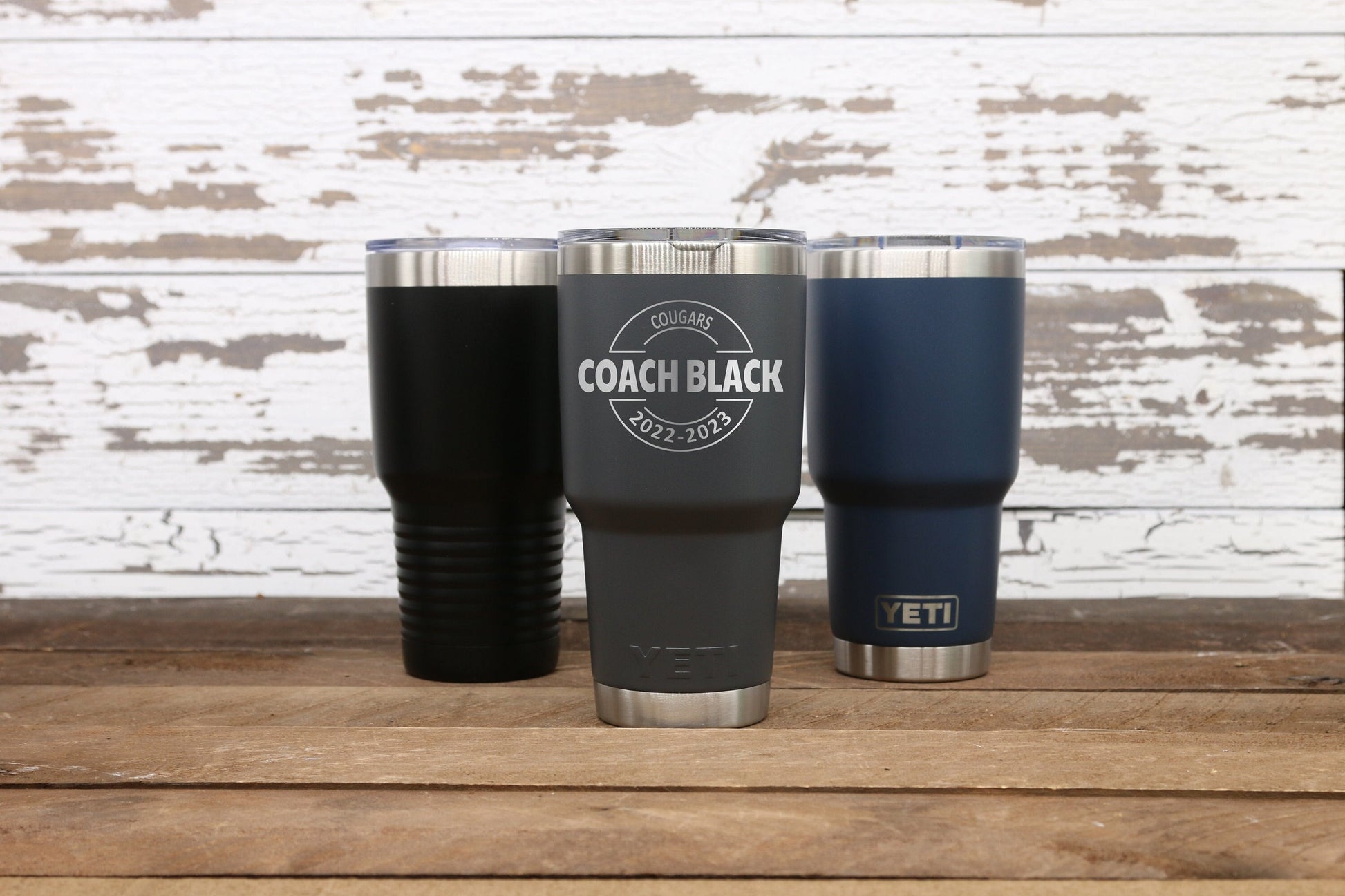 30oz tumbler with one side of engraving of the custom coaches design shown on the listing.  We are happy to help with ordering or to answer any further questions regarding the items and design.  Please contact us through Etsy Messages for assistance!