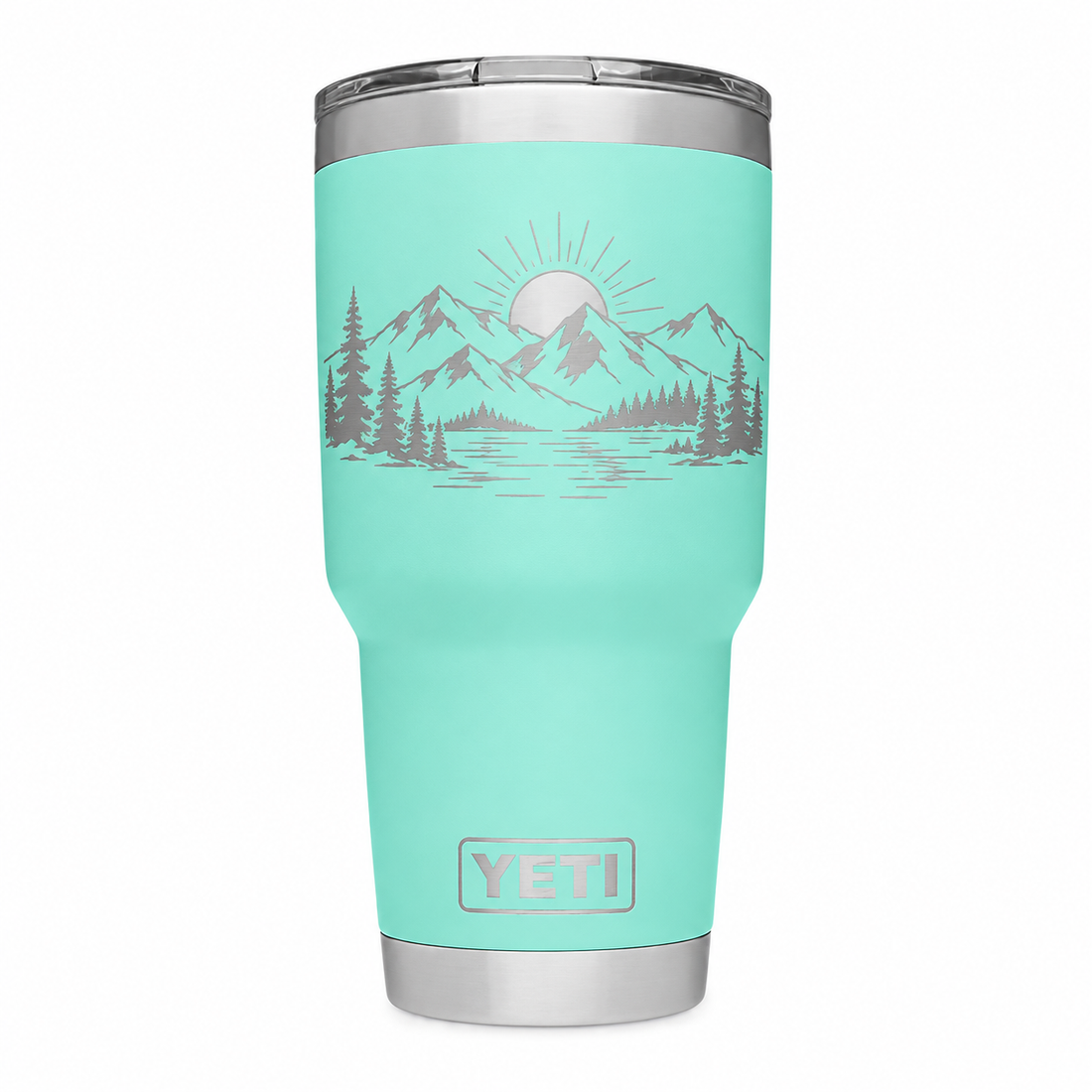 YETI 30 oz Seafoam with sample laser engraving: minimal mountain range, pines and sunrise