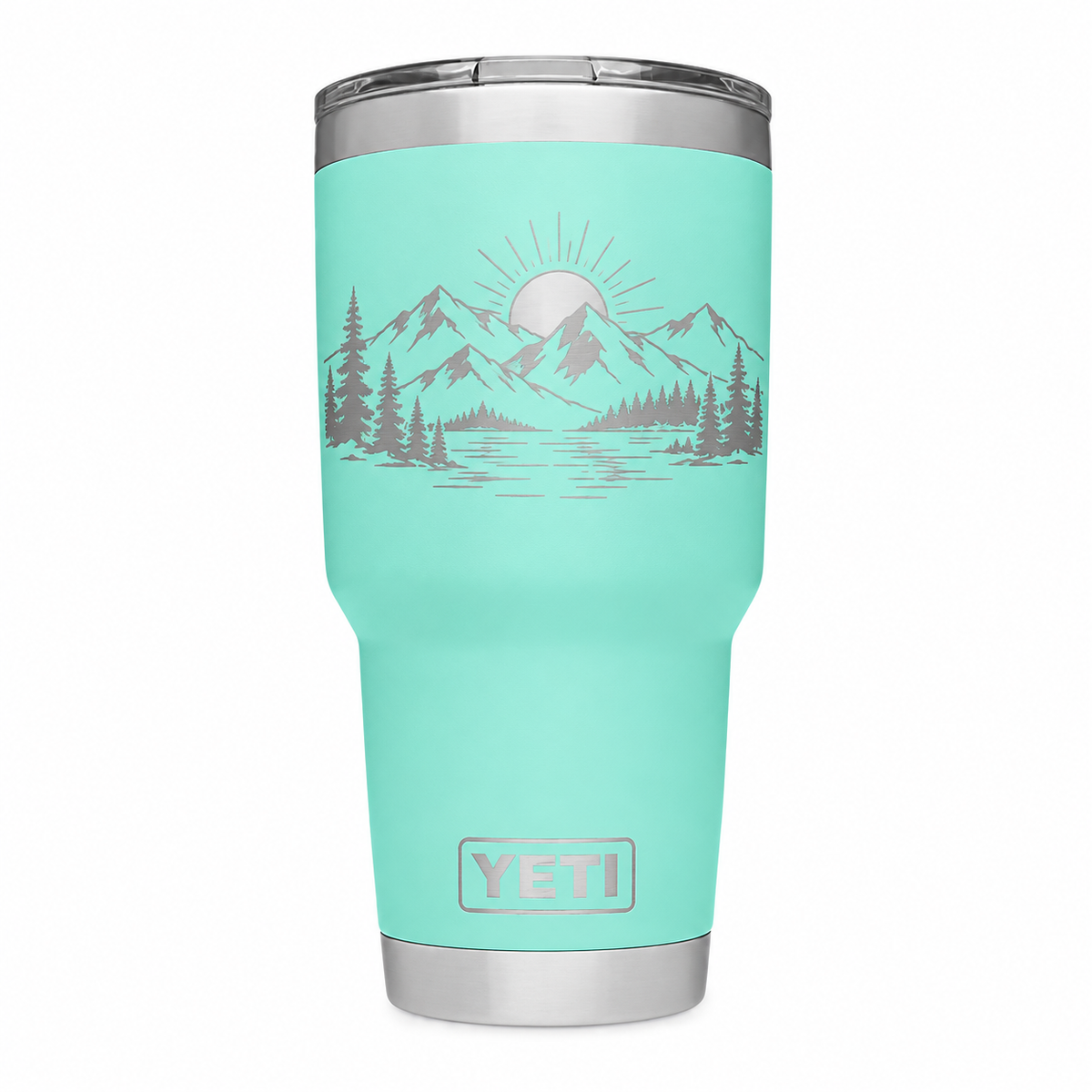 YETI 30 oz Seafoam with sample laser engraving: minimal mountain range, pines and sunrise